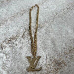 Louis Vuitton LV Gold-Plated Logo on a gold chain